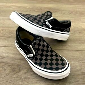Vans checkerboard slip-ons size 1. Worn a few times. Still in great condition.